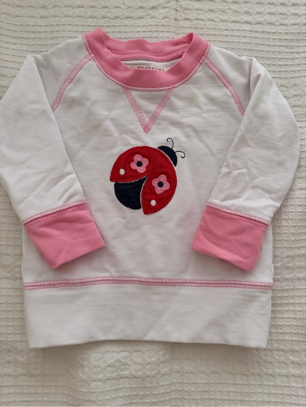 The Beaufort Bonnet Company White Sweatshirt with Pink Trim and Red Ladybug